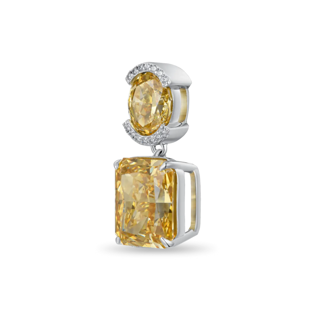 Фото и внешний вид — Серьга-подвеска Crushed Ice с желтым камнем изумрудной огранки и белой позолотой